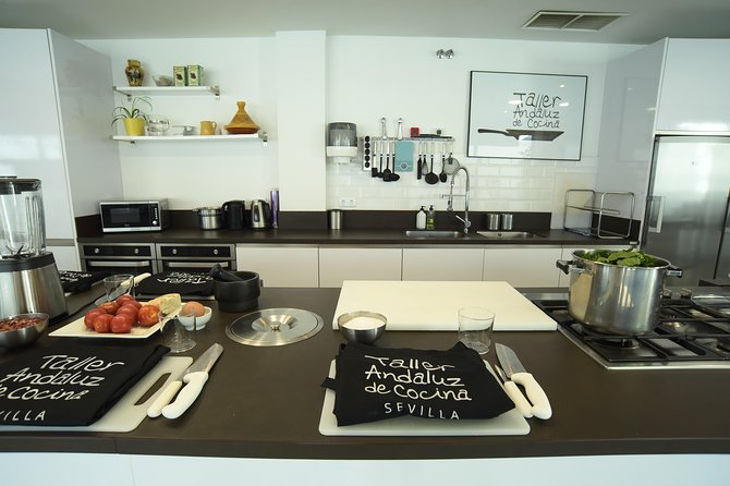 Spanish Cooking Class & Triana Market Tour in Sevilla - Cooking in the market kitchens: hands-on, not hands-off