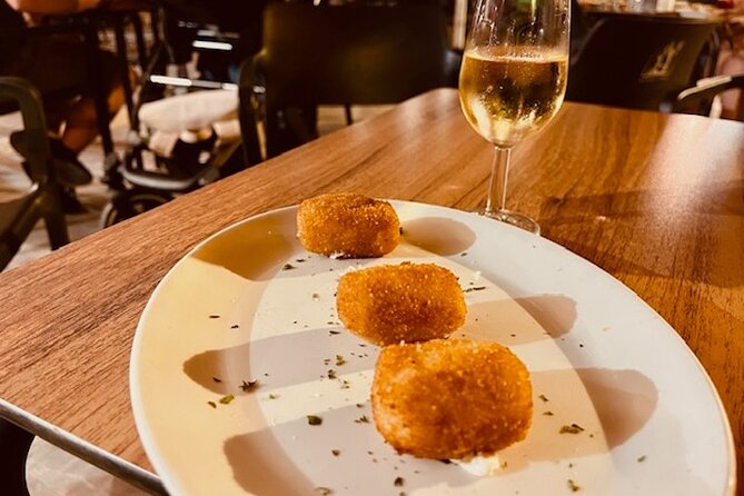 The Ultimate Seville Wine Tour with Food - Calle Mateos Gago: where the wine-and-food momentum builds