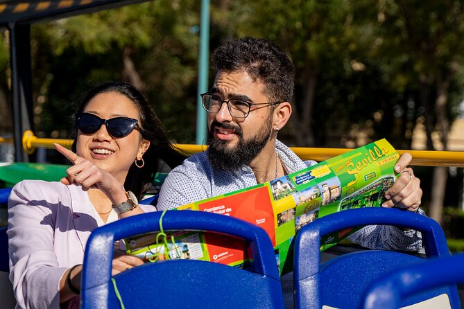 Tourist bus tour of Seville - Plaza de Cuba, Calle San Jacinto, and the Cristo de la Expiración Bridge
