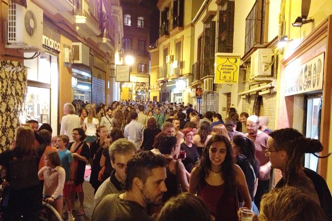 Triana Gourmet Tapas Tour in Seville - Puente de Isabel II: The River View Intermission