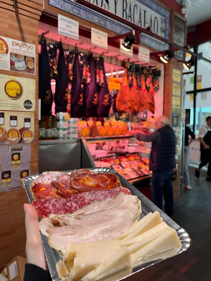 Triana Market Tapas Tour - What you’ll taste: acorn-fed ham, cured meats, olives, and sherry